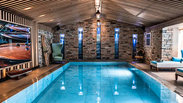 Indoor pool and relaxation area in Grandes Alpes Hotel Courchevel spa