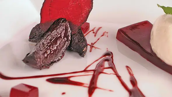 Exquisite dessert with beetroot textures by a chef in a premium Meribel chalet