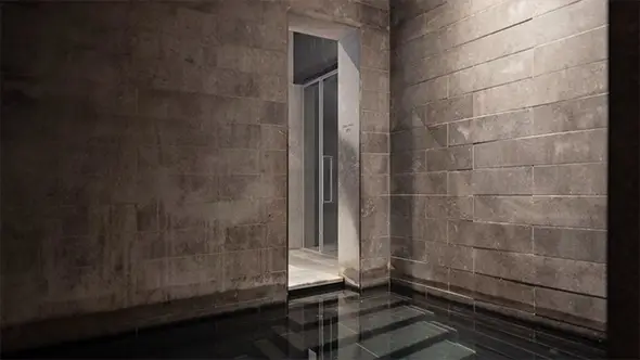 The Chedi Andermatt spa interior featuring stone walls and water therapy.