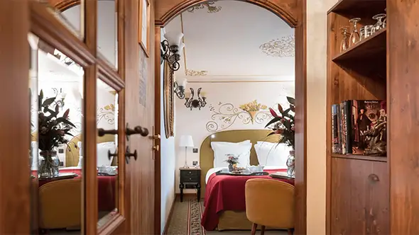 Cozy interior of a room at H&ocirc;tel de La Loze.