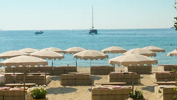 Umbrellas and sun loungers at the exclusive beach club.