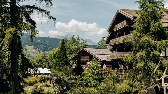 Exterior of Chalet Mont Arbois in summer.