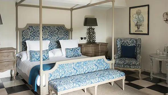 White and azure suite with a loggia balcony and panoramic sea views.