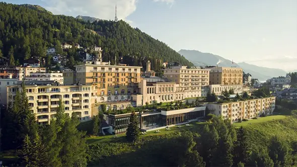 View of the historic facade of Kulm Hotel in St. Moritz.