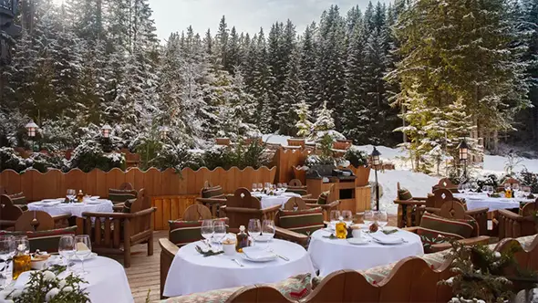 Outdoor terrace of BFire restaurant at Fouquet s Courchevel hotel.