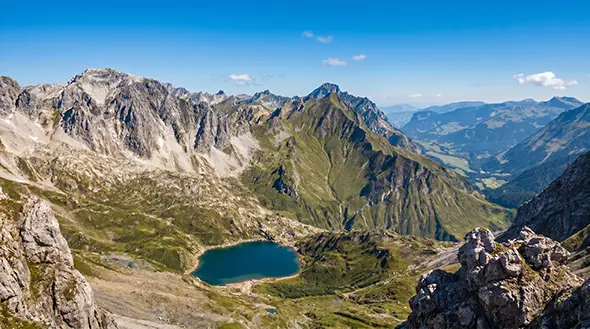 Mountain landscape of Lech with a lake near Mohnenfluh.