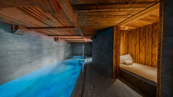 Indoor pool and spa area at chalet Orso in Val dIsere