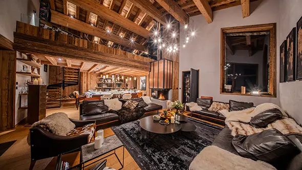 Spacious living room and dining area interior at chalet Orso in Val dIsere