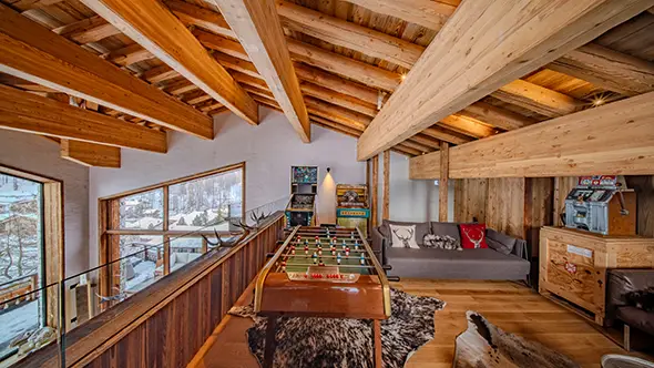 Mezzanine games area with table football at chalet Orso in Val dIsere