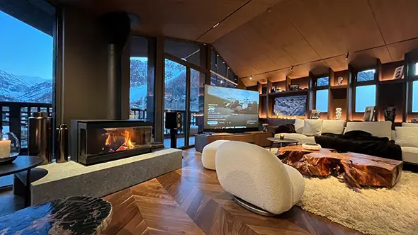 Home cinema and lounge area with panoramic views in Chalet Cristal