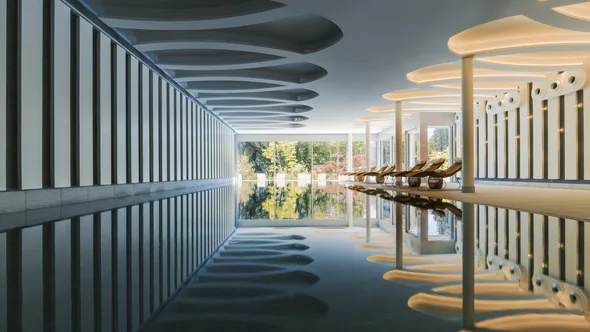 The 20-metre indoor pool at Chenot Palace Weggis, with the garden seen through the glass at the far end