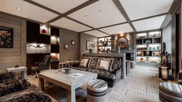 The lounge with a fireplace at Le K2 Djola, Courchevel 1850