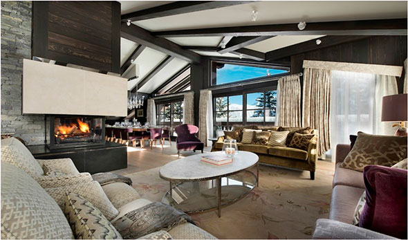 Illustration: Fireplace in a chalet living room, creating an informal atmosphere for team building and trust.