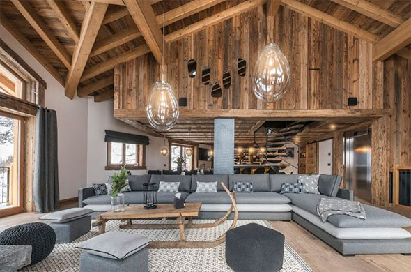 Stylish illustration: Elegant living room of a premium chalet, symbolizing inclusive services and financial predictability.