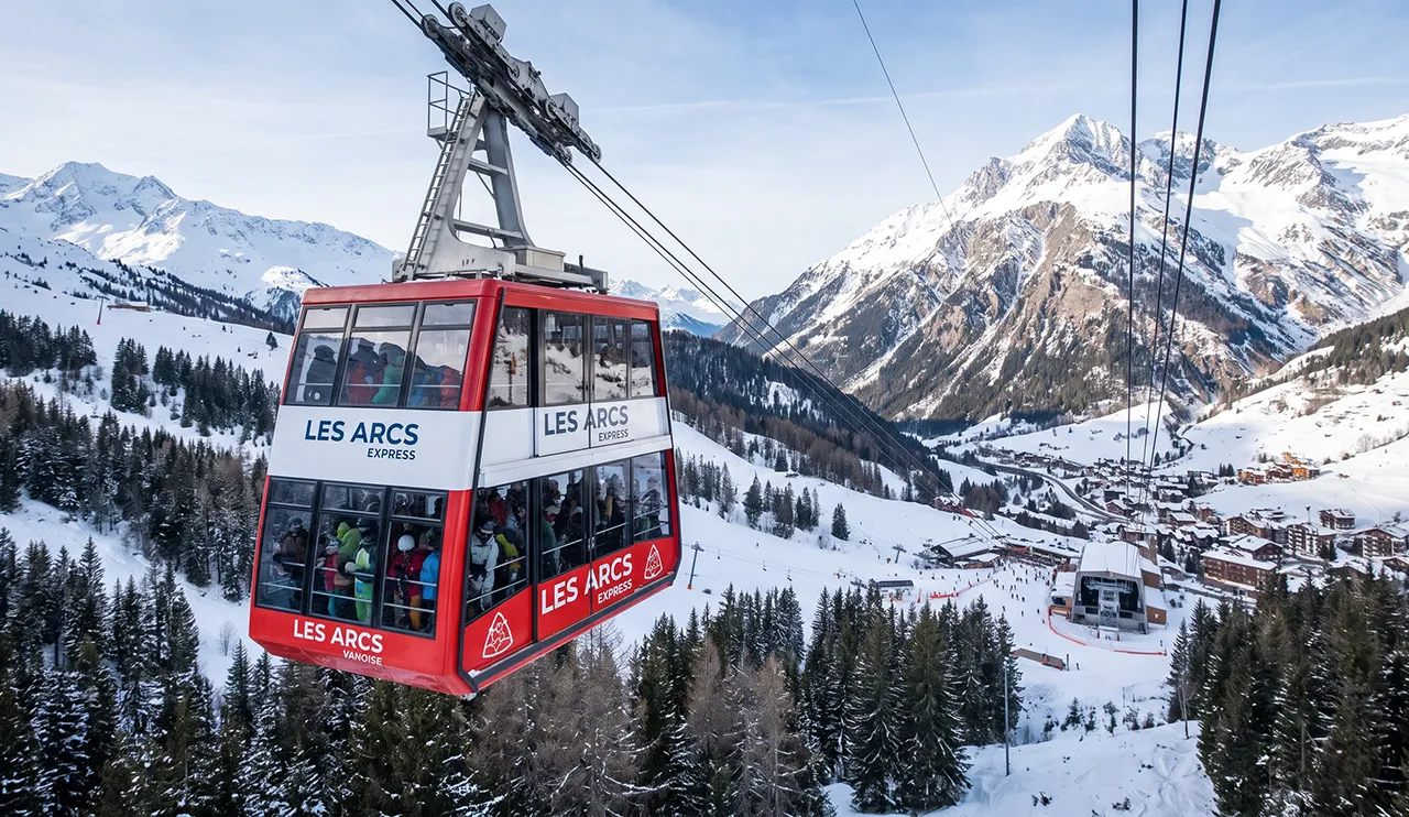 Double-decker cable car crossing the valley between Les Arcs and La Plagne