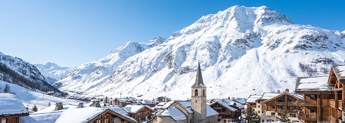 Winter Val d Isere village with an old church