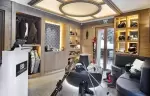 Ski room with ski and boot storage and a door onto the snow at Lys Martagon, Courchevel 1850