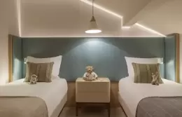 Penthouse Suite master bedroom under the roof beams, Hotel Mont-Blanc Chamonix