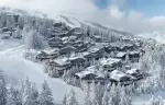 Aerial view of the hamlet above the forest at Le K2 Palace, Courchevel 1850