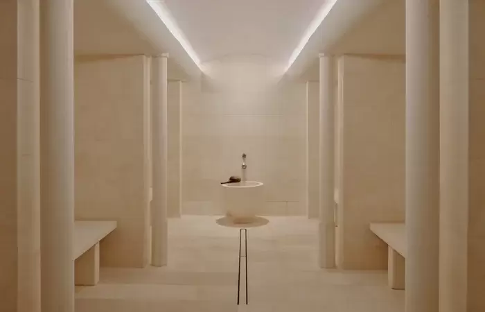 Vaulted Capri-stone hammam with a central basin at Aman Le Melezin