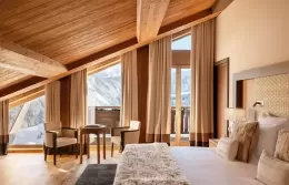 Elegant Prestige room at Fouquets Courchevel with Alpine views.
