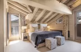 The bed in an Executive Room at Le K2 Altitude, Courchevel 1850