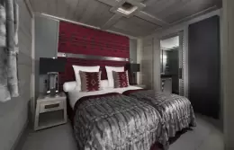 The second bedroom in a Family Junior Suite at Le K2 Altitude, Courchevel 1850