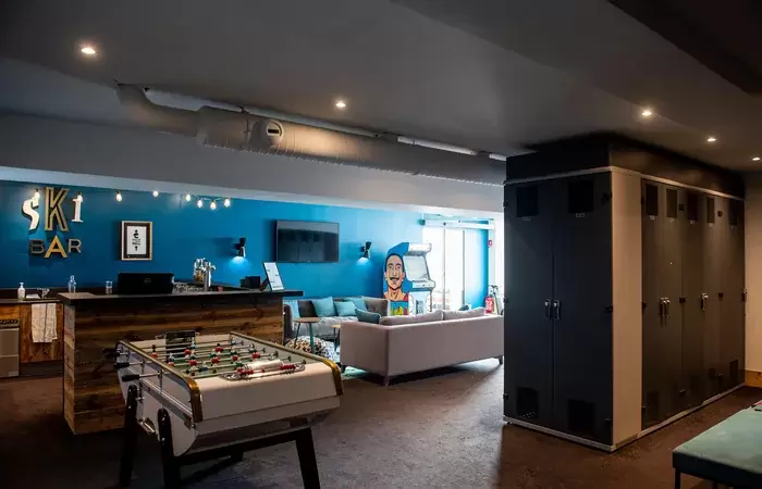 Ski room with ski bar, table football and lockers at Fahrenheit Seven Val Thorens