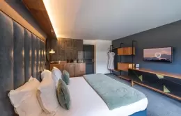Master bedroom with double bed in the Family Room at Fahrenheit Seven Courchevel
