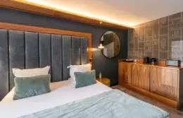 Master bedroom with double bed in the Family Room at Fahrenheit Seven Courchevel