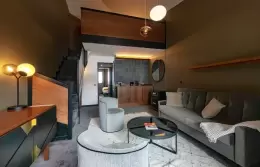 Black marble bathroom with bathtub and walk-in shower, Family Duplex Suite, Fahrenheit Seven Courchevel