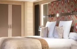 The bed in a Comfort Room at Le K2 Djola, Courchevel 1850