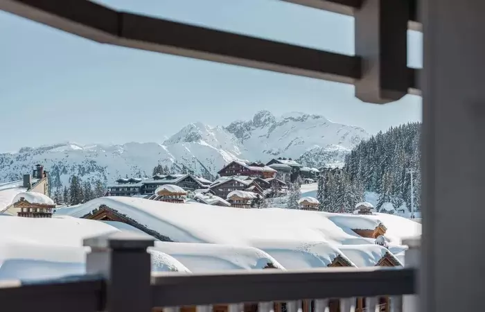 A balcony with a mountain view at Le K2 Djola, Courchevel 1850