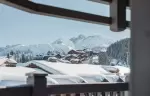 A balcony with a mountain view at Le K2 Djola, Courchevel 1850