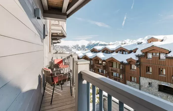 A balcony with a view over the village at Le K2 Djola, Courchevel 1850