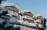 The hotel facade and balconies at Le K2 Djola, Courchevel 1850