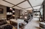 The lounge with a fireplace at Le K2 Djola, Courchevel 1850