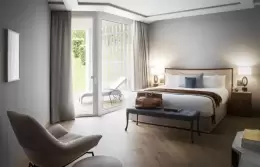A Classic Room with a king-size bed and glass doors to the garden, Chenot Palace Weggis