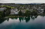Aerial view of the hotel on the shore of Lake Lucerne in Weggis, Chenot Palace Weggis