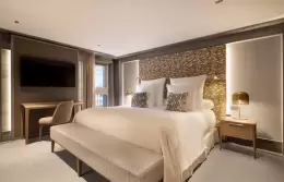 The bedroom in a Junior Suite at Le K2 Chogori, Val d'Isere
