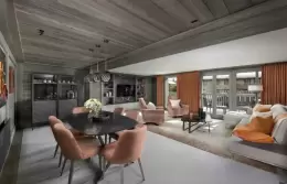The living and dining room of the Himalaya Suite at Le K2 Chogori, Val d'Isere