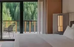 Premiere suite with a forest view at Rosa Alpina.