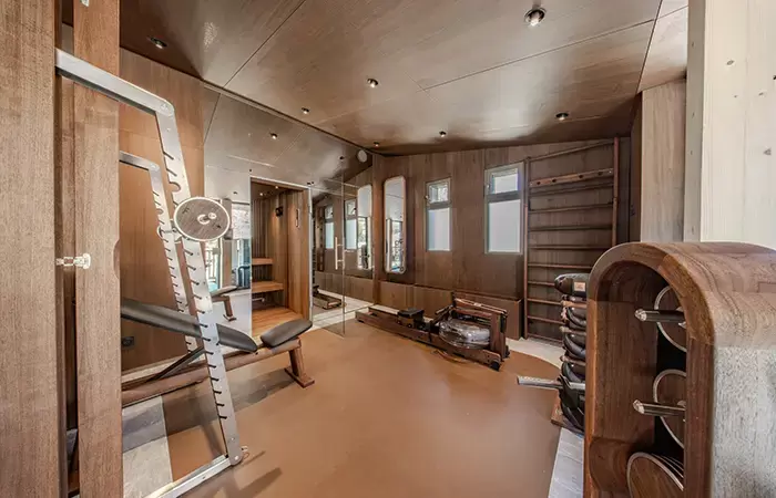 Gym with exercise equipment in chalet Cristal in Val d-Isere.