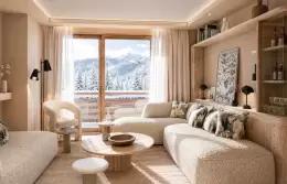 Master Suite bedroom with a fireplace and a wide window onto the peaks at Barma, La Tania