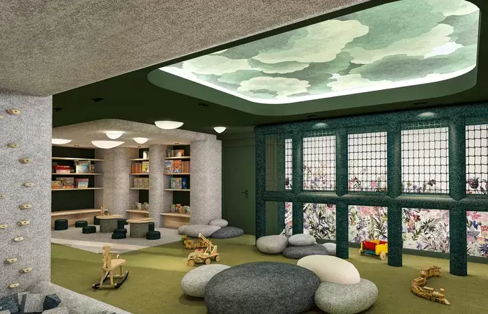 Children play area with bookshelves and pebble cushions at Barma Hotel & Spa, La Tania