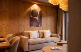 Bedroom with a window onto the mountains in a Superior Apartment at Barma Residence, Courchevel La Tania