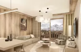 Bedroom with a dark green throw and a balcony onto the peaks in a Deluxe Apartment at Barma Residence, La Tania