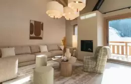 Bedroom with a dark throw and a balcony door onto the mountains, Duplex Signature Apartment, Barma Residence
