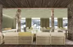 Indoor pool with a carved wooden bear and loungers facing the snow at Barma, La Tania