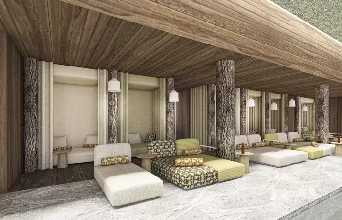 Spa relaxation area with day beds and tree-trunk pillars at Barma, Courchevel La Tania